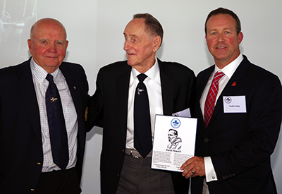 Paul Henderson inducts David Howard; Todd Irving, Sail Canada President presents plaque